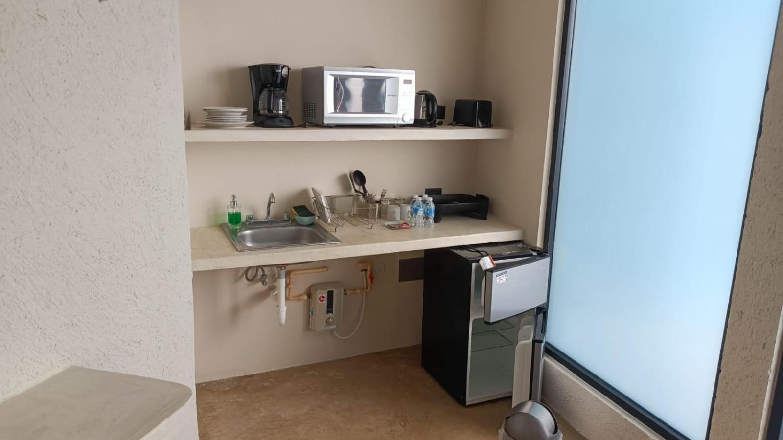 Aparthotel Xuva Mérida Pokoj fotografie